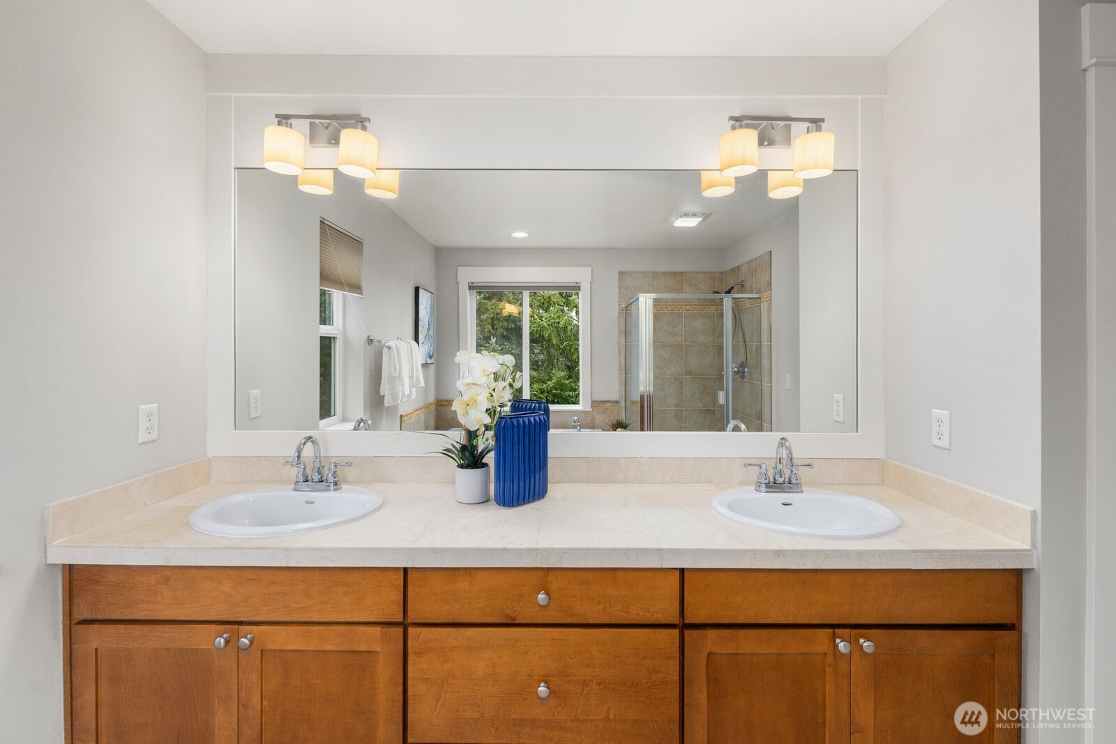 5620 Northeast 6th Place Renton, WA 98059 - Photo 23 of 37 a bathroom with a sink and a mirror