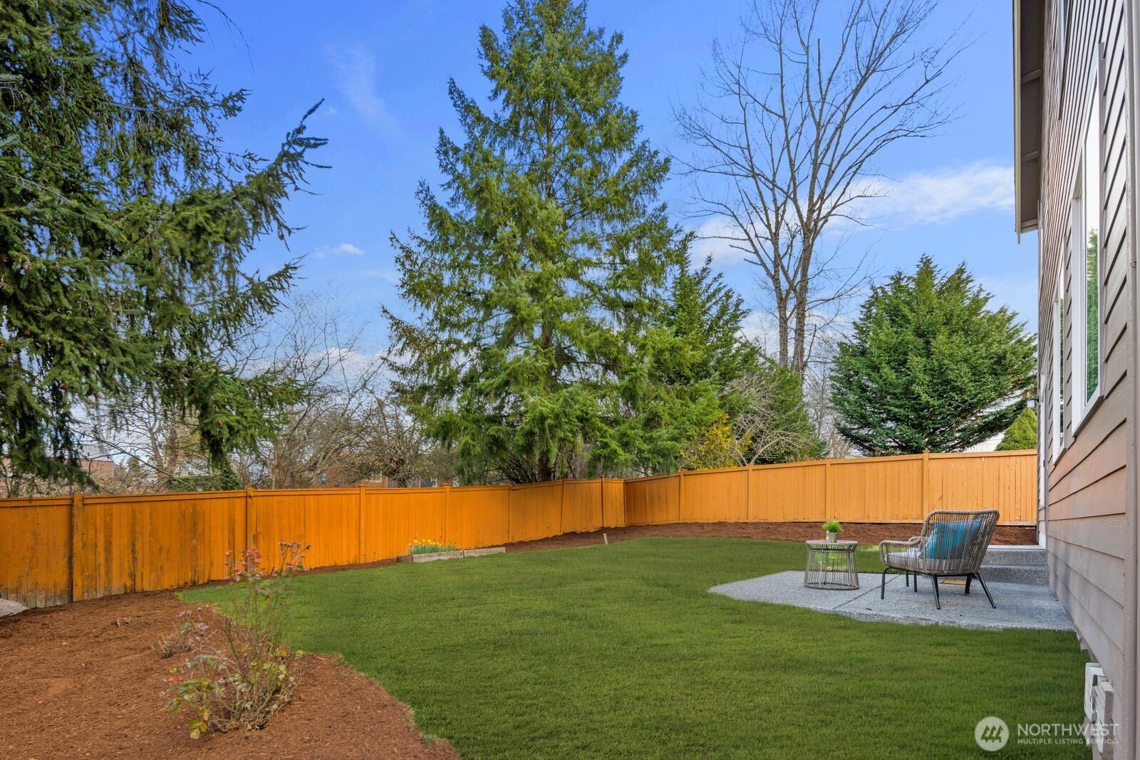 5620 Northeast 6th Place Renton, WA 98059 - Photo 30 of 37 a view of backyard with swimming pool and seating space