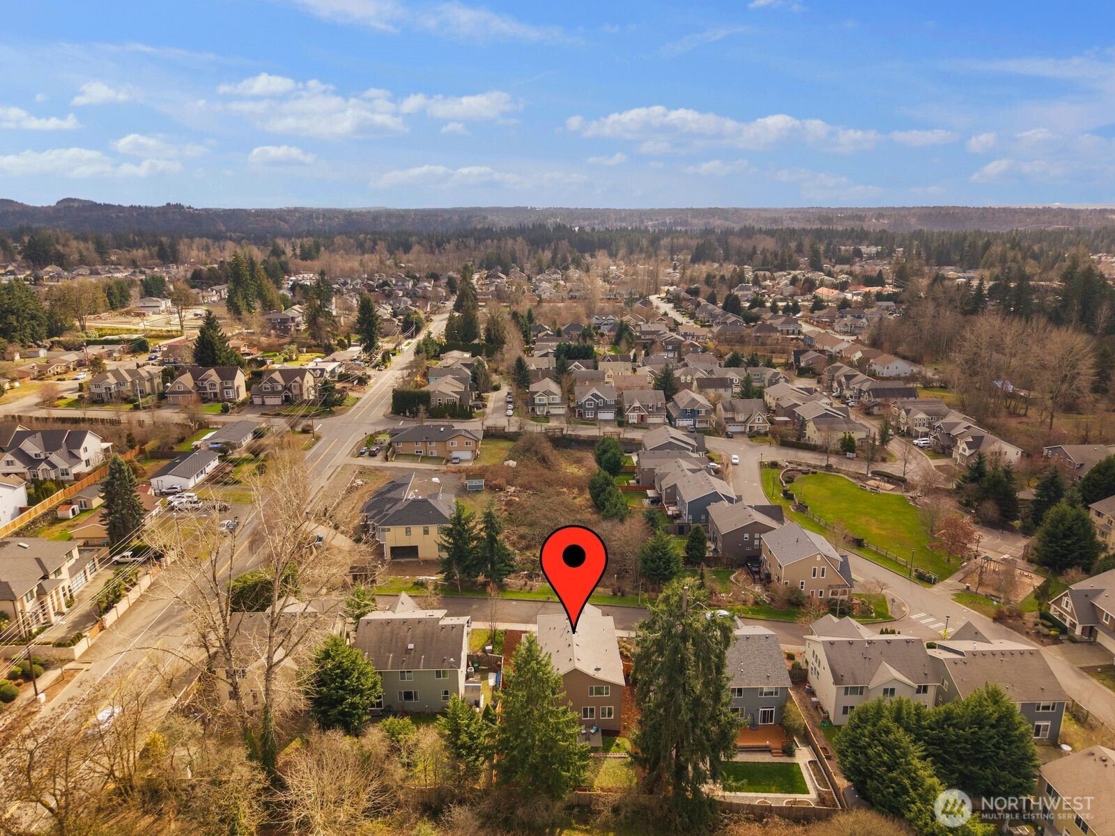 5620 Northeast 6th Place Renton, WA 98059 - Photo 34 of 37 an aerial view of residential building and parking space