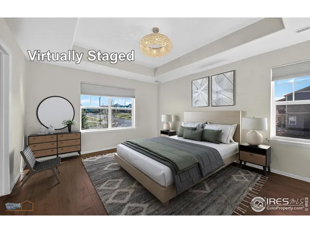 a bedroom with bed and a window