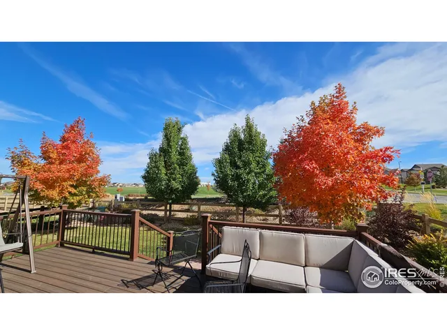 a view from deck with patio