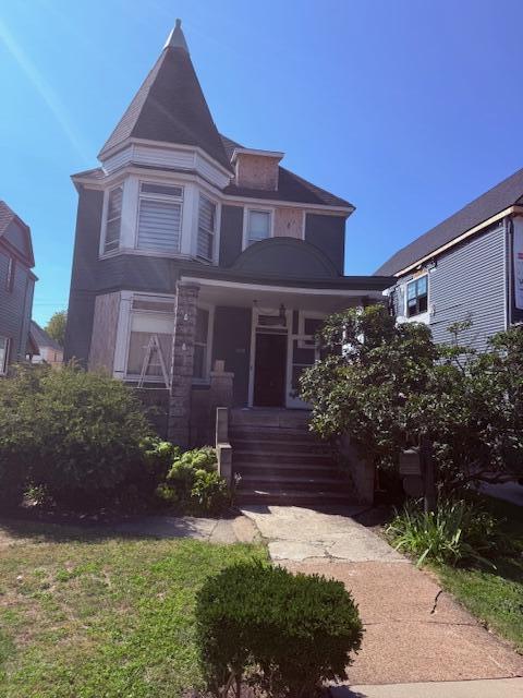 1828 Oliver Street Whiting, IN 46394 - Photo 2 of 37 a front view of a house with a yard