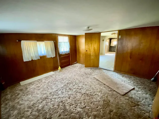 a bedroom with a bed and a cabinets