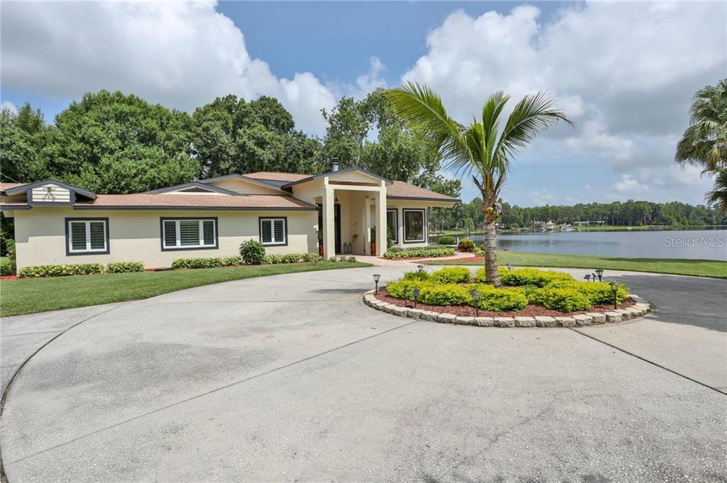 Front of house with circular driveway