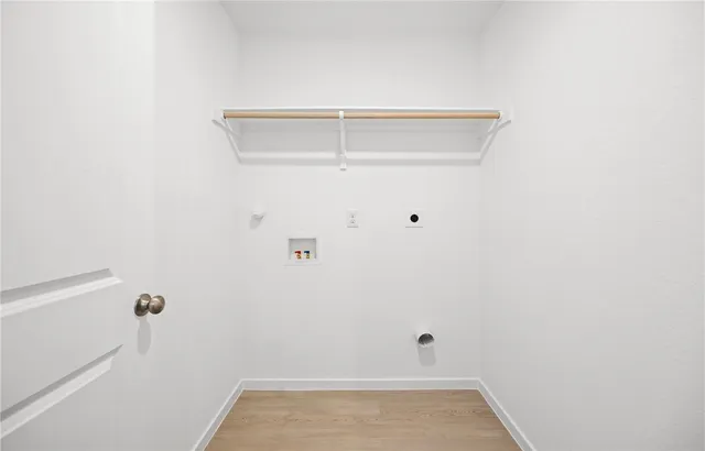 a view of small space with racks on the wall