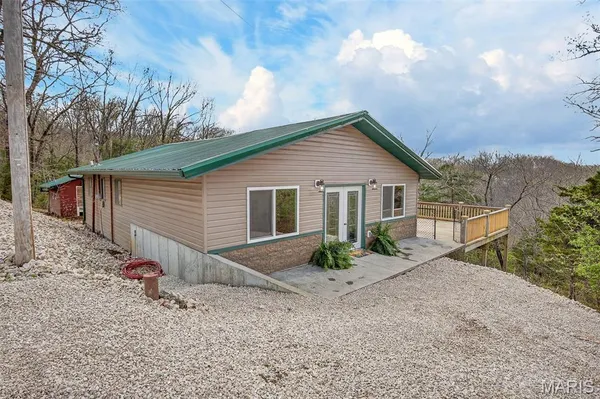 $325,000 | 89 Singing Oaks Drive, Sunrise Beach, MO 65079