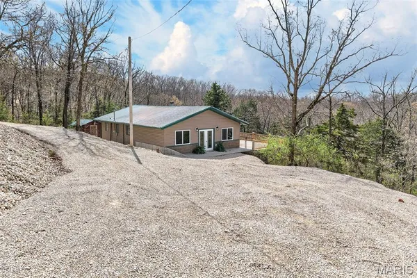 $325,000 | 89 Singing Oaks Drive, Sunrise Beach, MO 65079