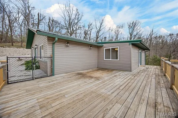 $325,000 | 89 Singing Oaks Drive, Sunrise Beach, MO 65079