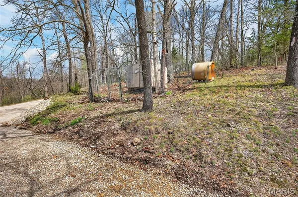 $325,000 | 89 Singing Oaks Drive, Sunrise Beach, MO 65079
