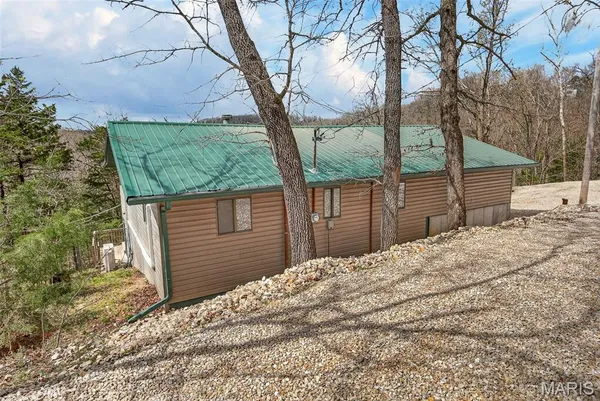 $325,000 | 89 Singing Oaks Drive, Sunrise Beach, MO 65079