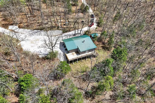 $325,000 | 89 Singing Oaks Drive, Sunrise Beach, MO 65079