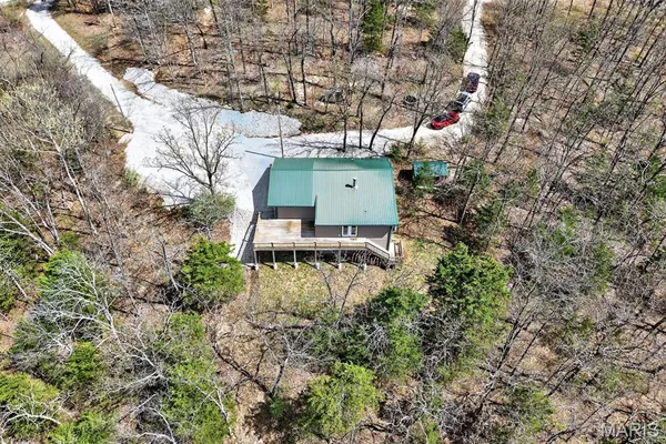 $325,000 | 89 Singing Oaks Drive, Sunrise Beach, MO 65079