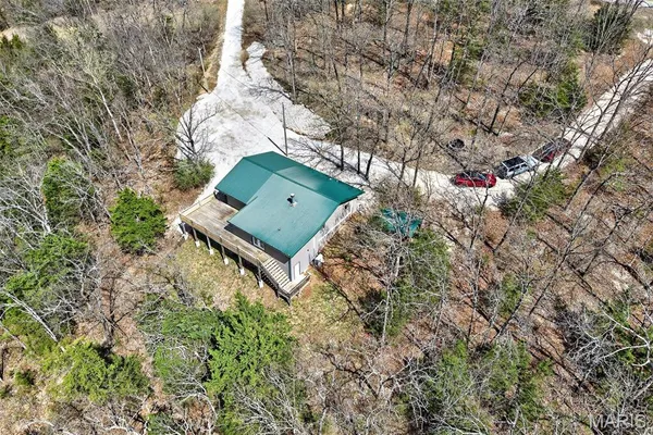 $325,000 | 89 Singing Oaks Drive, Sunrise Beach, MO 65079
