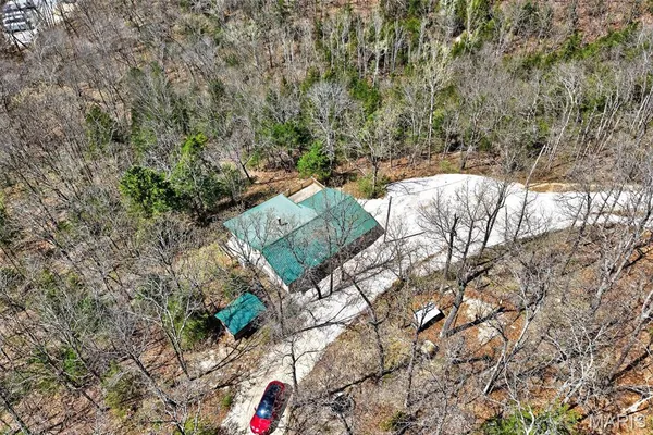 $325,000 | 89 Singing Oaks Drive, Sunrise Beach, MO 65079
