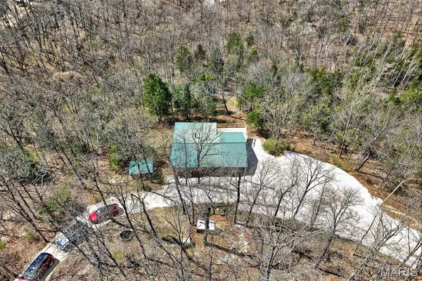 $325,000 | 89 Singing Oaks Drive, Sunrise Beach, MO 65079