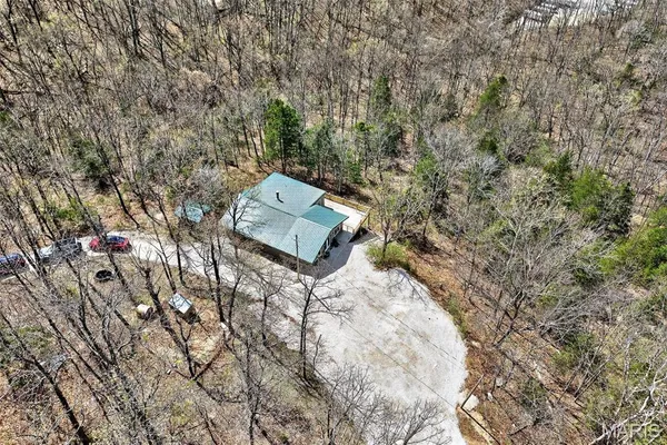 $325,000 | 89 Singing Oaks Drive, Sunrise Beach, MO 65079