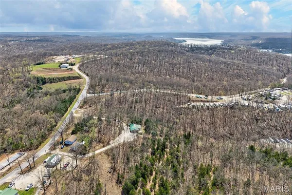 $325,000 | 89 Singing Oaks Drive, Sunrise Beach, MO 65079