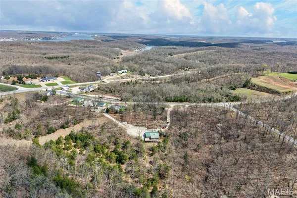 $325,000 | 89 Singing Oaks Drive, Sunrise Beach, MO 65079