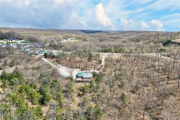 $325,000 | 89 Singing Oaks Drive, Sunrise Beach, MO 65079