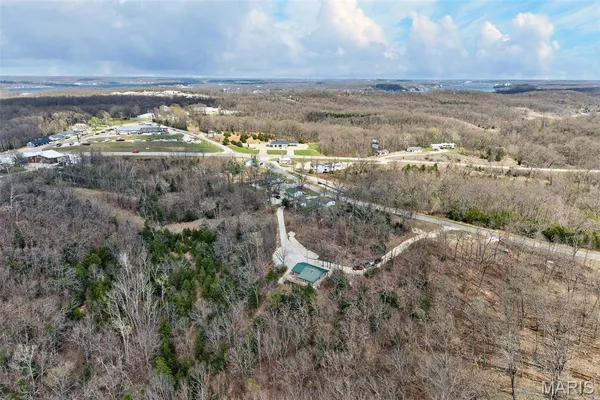 $325,000 | 89 Singing Oaks Drive, Sunrise Beach, MO 65079