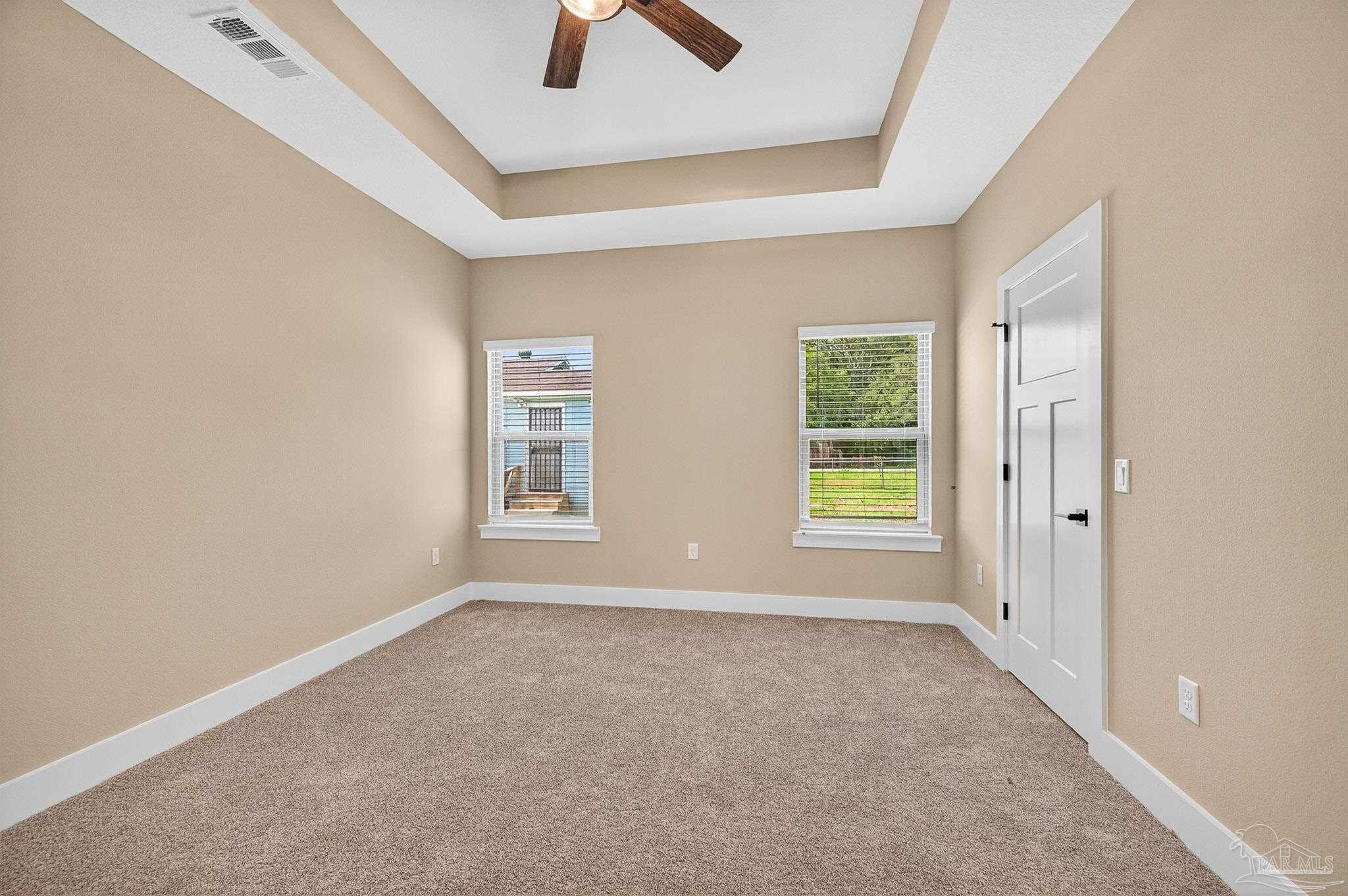 205 Webb Street Cantonment, FL 32533 - Photo 20 of 49 a view of an empty room with a window