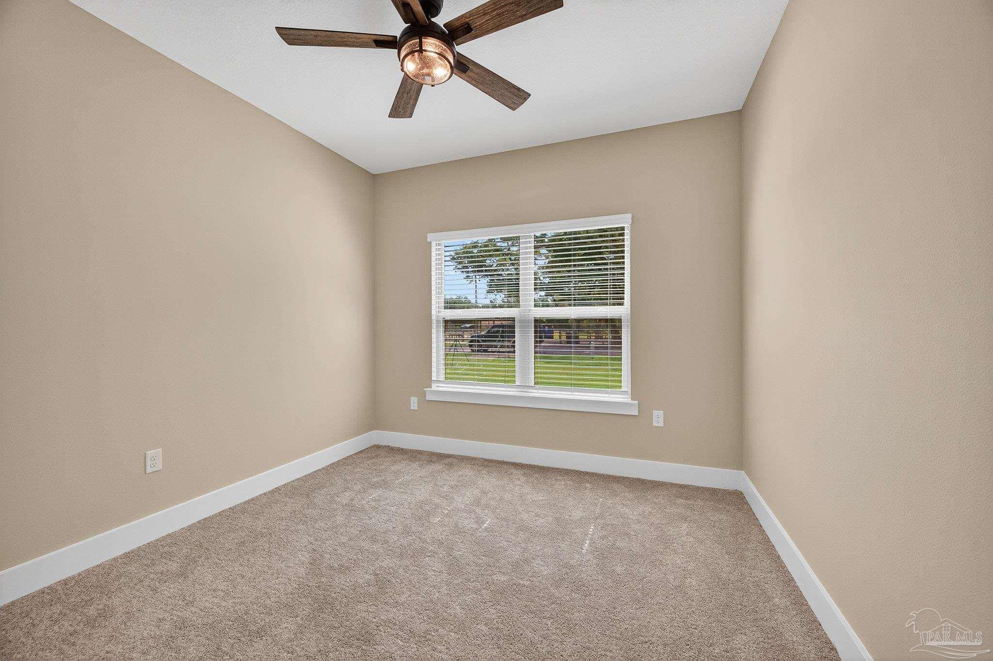 205 Webb Street Cantonment, FL 32533 - Photo 27 of 49 an empty room with a window