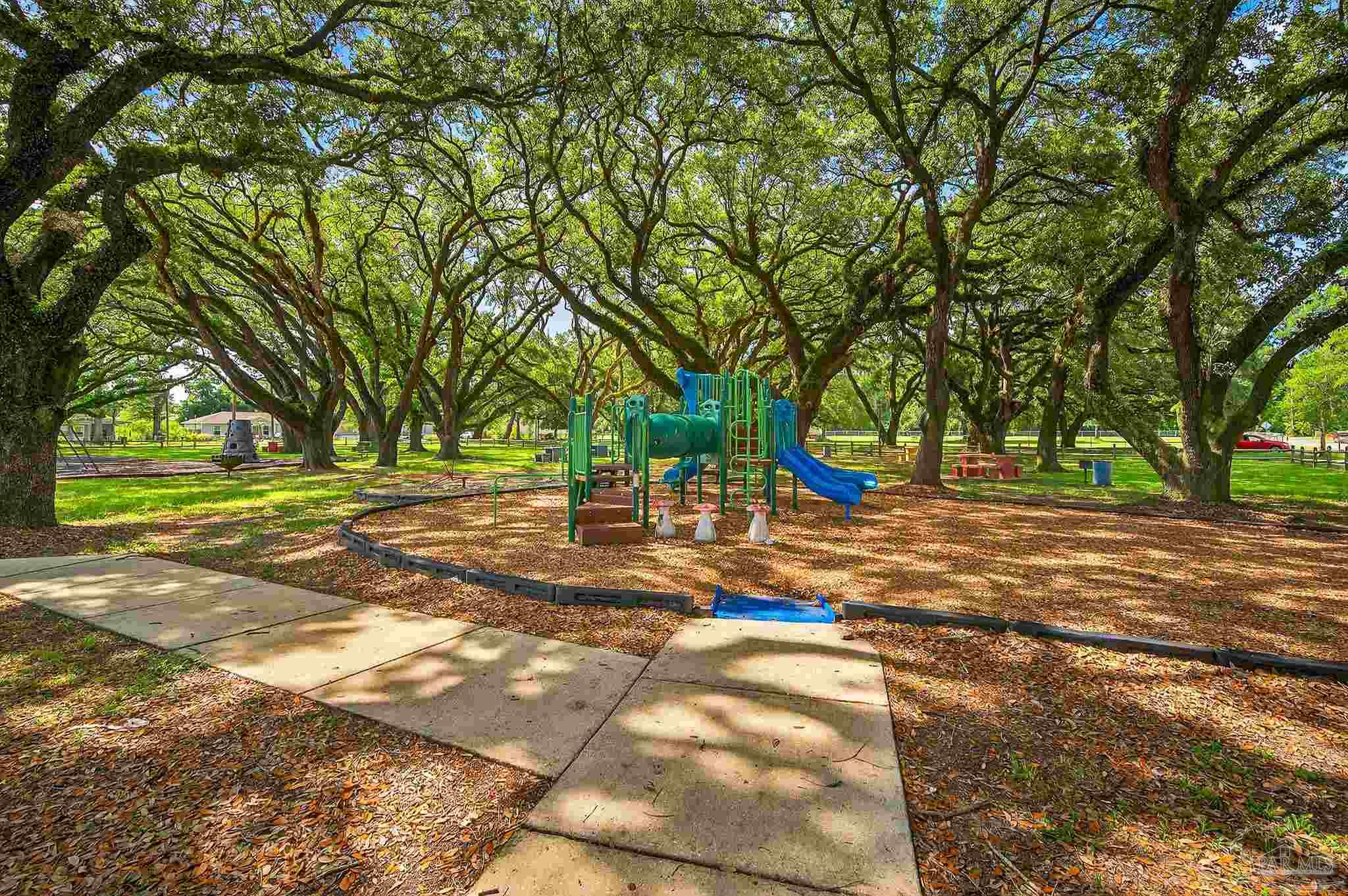 205 Webb Street Cantonment, FL 32533 - Photo 47 of 49 a view of a playground with basketball court