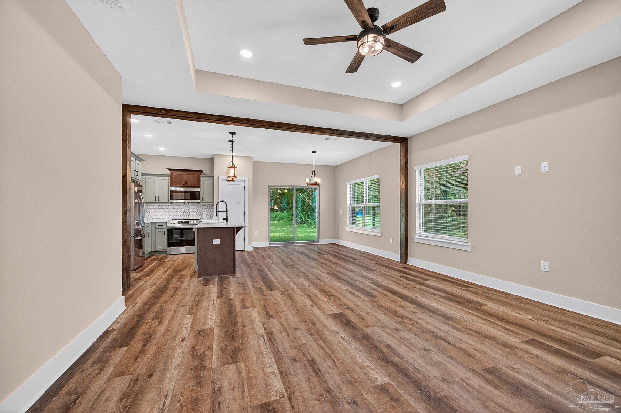 205 Webb Street Cantonment, FL 32533 - Photo 7 of 49 a very nice looking room with a large window