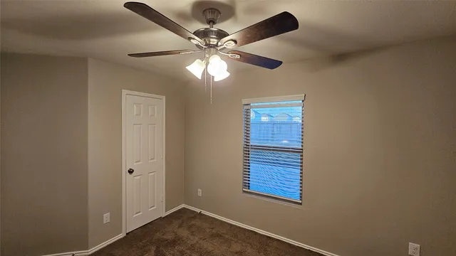 a bathroom with a granite countertop sink toilet and a bathtub