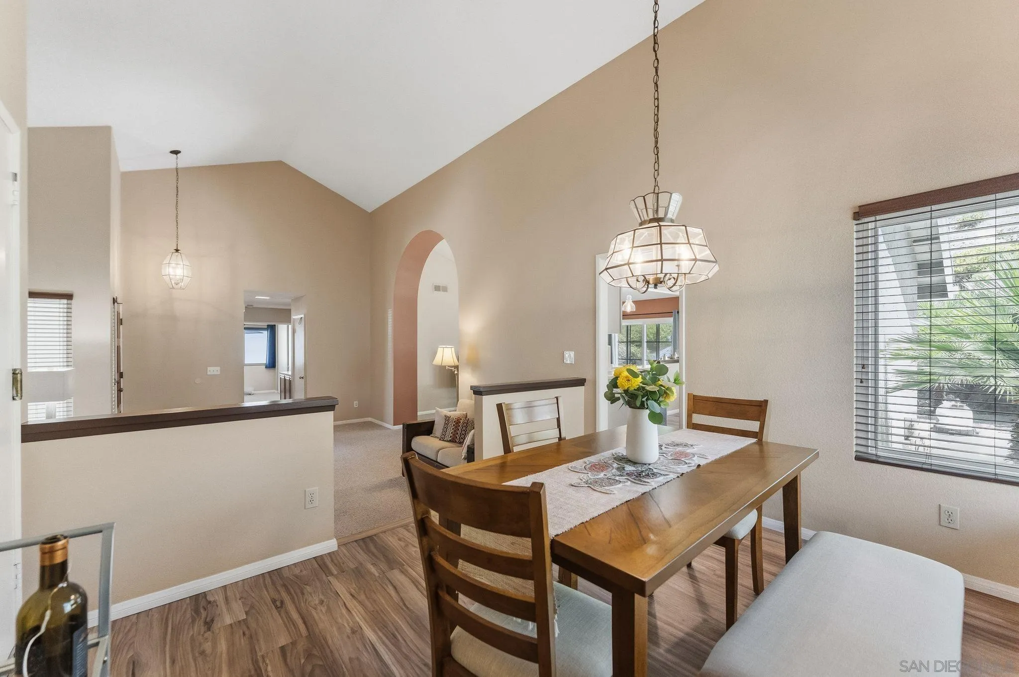10565 Strathmore Drive Santee, CA 92071 - Photo 25 of 59 a view of a dining room with furniture and wooden floor