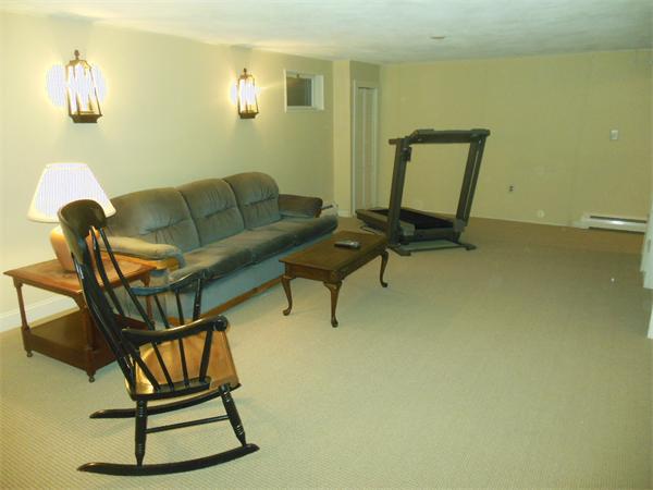 104 Kendall Road Lexington, MA 02421 - Photo 8 of 10 a living room with furniture and a window