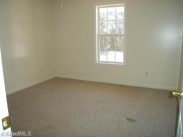 252 Tyro Heights Road Lexington, NC 27295 - Photo 9 of 12 1st Bedroom.