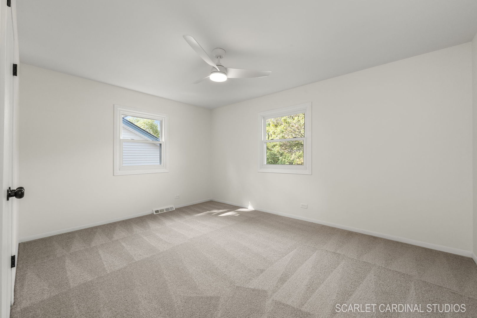 819 Delles Road Wheaton, IL 60189 - Photo 11 of 28 an empty room with windows and closet