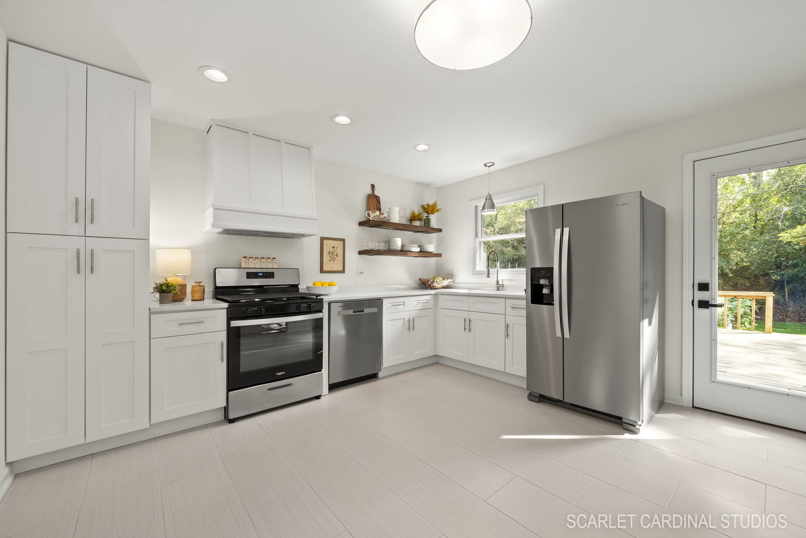 819 Delles Road Wheaton, IL 60189 - Photo 8 of 28 a kitchen with a refrigerator a sink and a stove