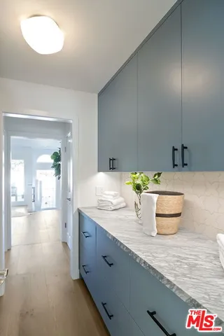 a bedroom with bed and window