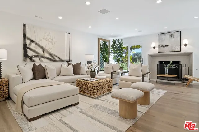 a view of a dining room with furniture wooden floor and chandelier