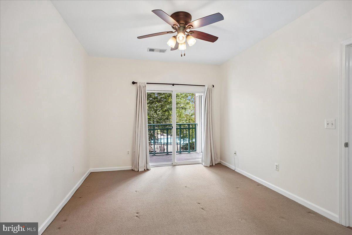 Undisclosed Address Reston, VA 20190 - Photo 13 of 60 Bedroom With Sliding Door to same Balcony