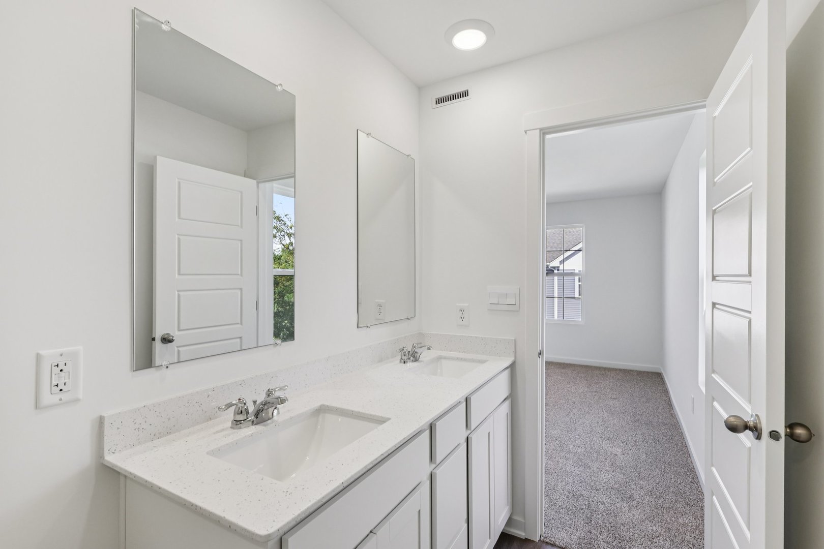 1435 Oakfield Lane Pingree Grove, IL 60140 - Photo 14 of 60 a bathroom with a sink a mirror and a shower
