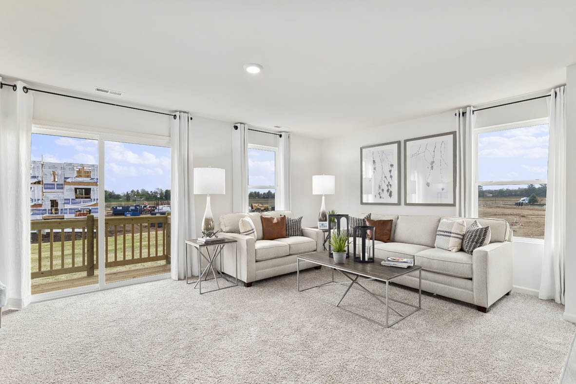 1435 Oakfield Lane Pingree Grove, IL 60140 - Photo 33 of 60 a living room with furniture cabinets and a large window
