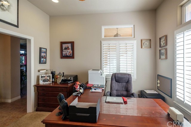 19286 Kanbridge Street Apple Valley, CA 92308 - Photo 17 of 37 a room with furniture and window