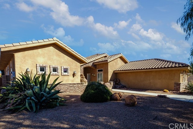 19286 Kanbridge Street Apple Valley, CA 92308 - Photo 2 of 37 a front view of a house with a garage