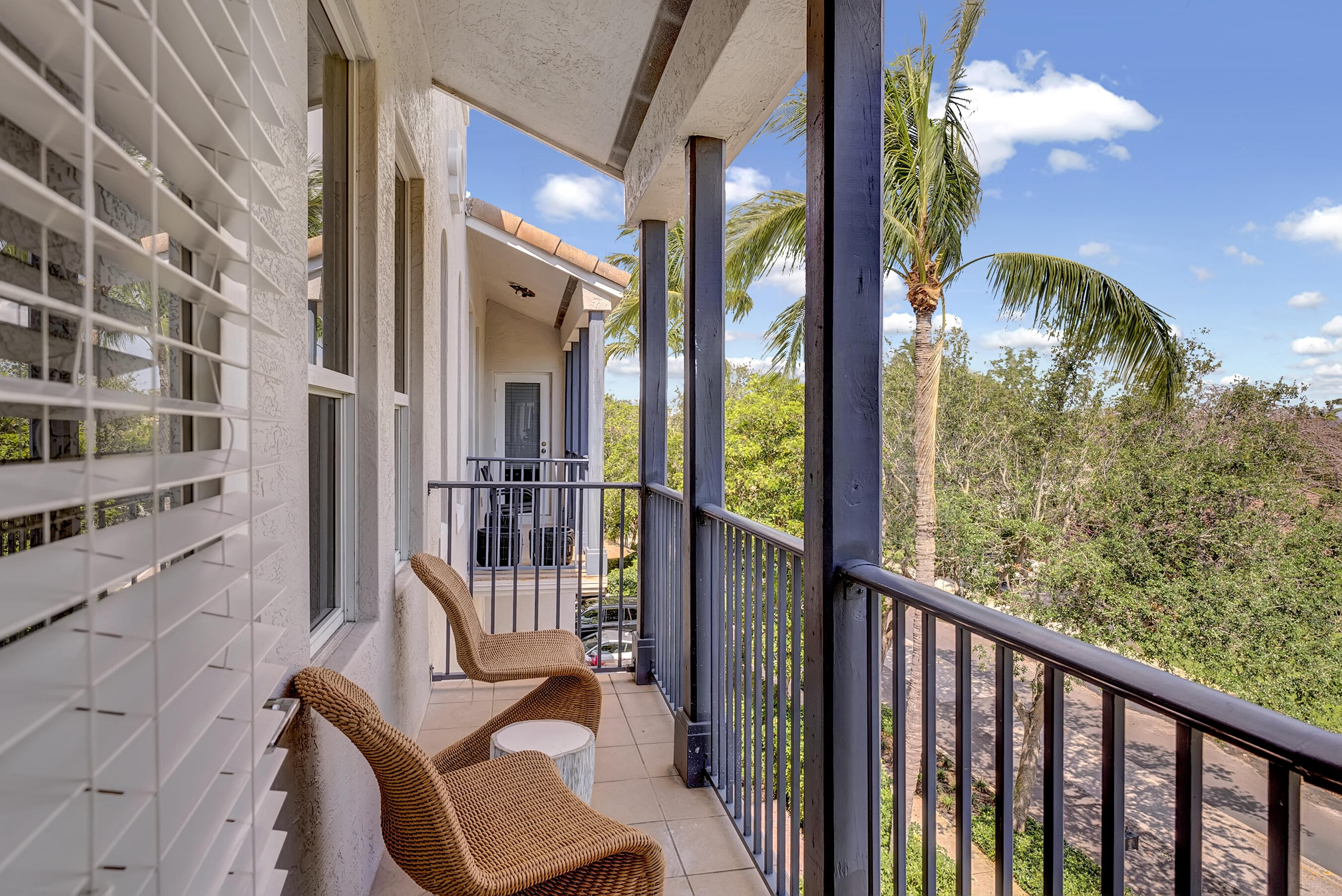 462 East Boca Raton Road Boca Raton, FL 33432 - Photo 15 of 43 a view of a balcony with chair and the floor to ceiling window