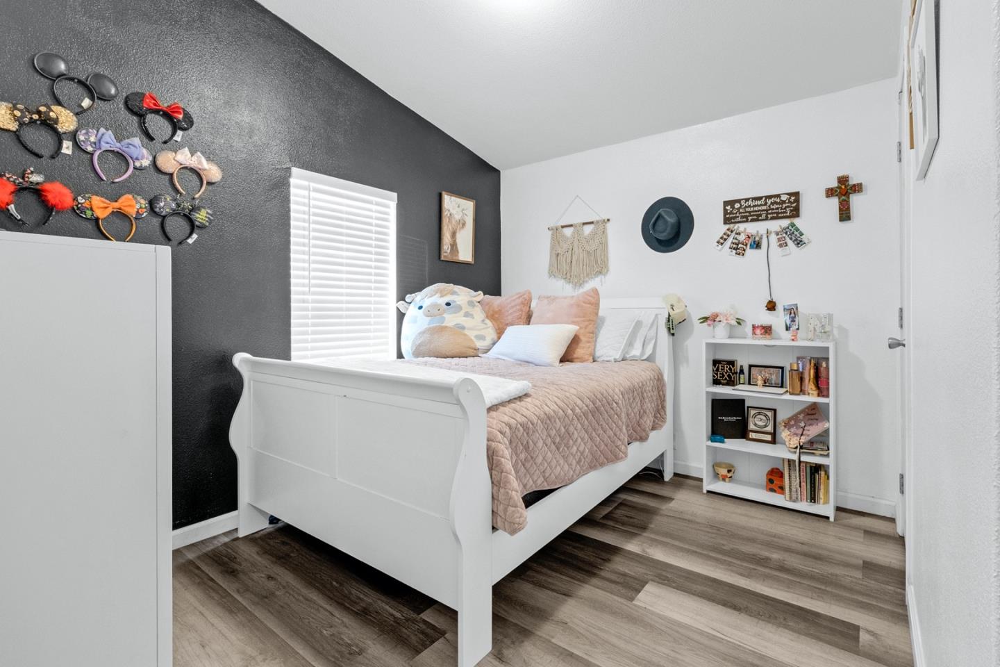 1900 Highway 1, Unit 62 Moss Landing, CA 95039 - Photo 16 of 21 a bedroom with a bed and a window