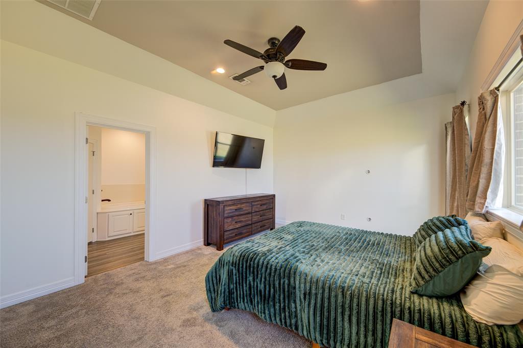 148 County Road 2830 Decatur, TX 76234 - Photo 12 of 38 Primary bedroom.
