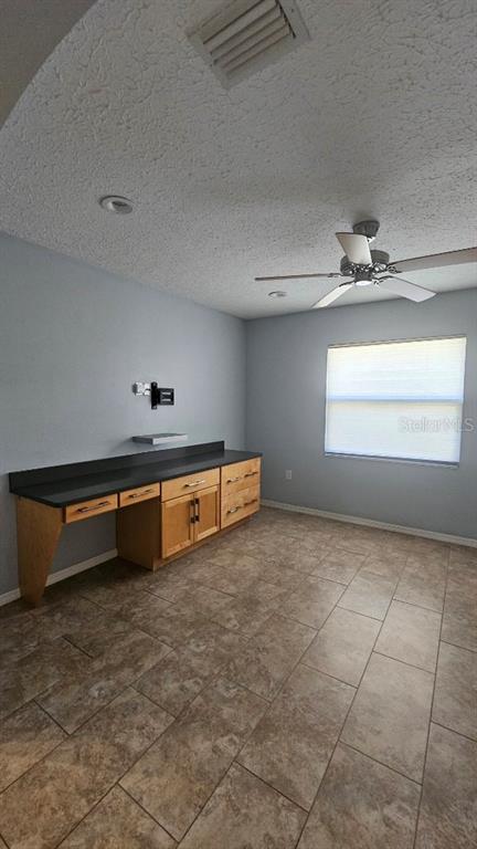 882 Lucas Lane Oldsmar, FL 34677 - Photo 14 of 27 a view of an empty room and window