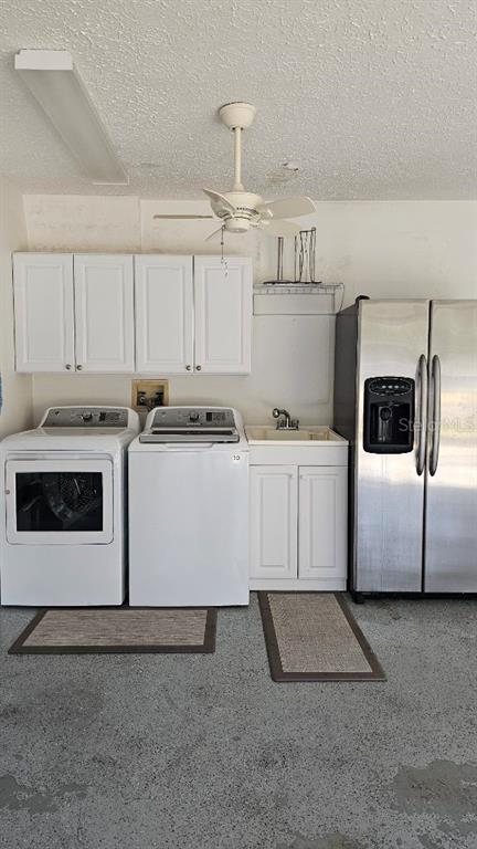 882 Lucas Lane Oldsmar, FL 34677 - Photo 27 of 27 a utility room with cabinets washer and dryer