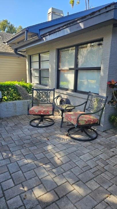 882 Lucas Lane Oldsmar, FL 34677 - Photo 5 of 27 a car parked in front of a house