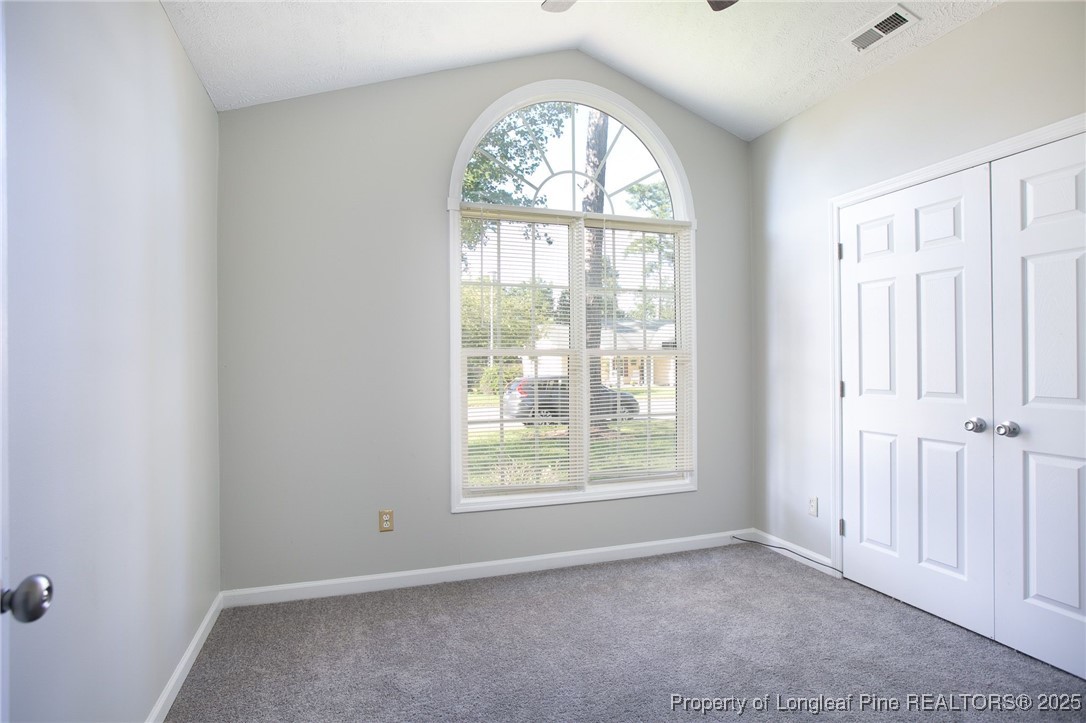 163 Independence Drive Raeford, NC 28376 - Photo 8 of 10 an empty room with a window