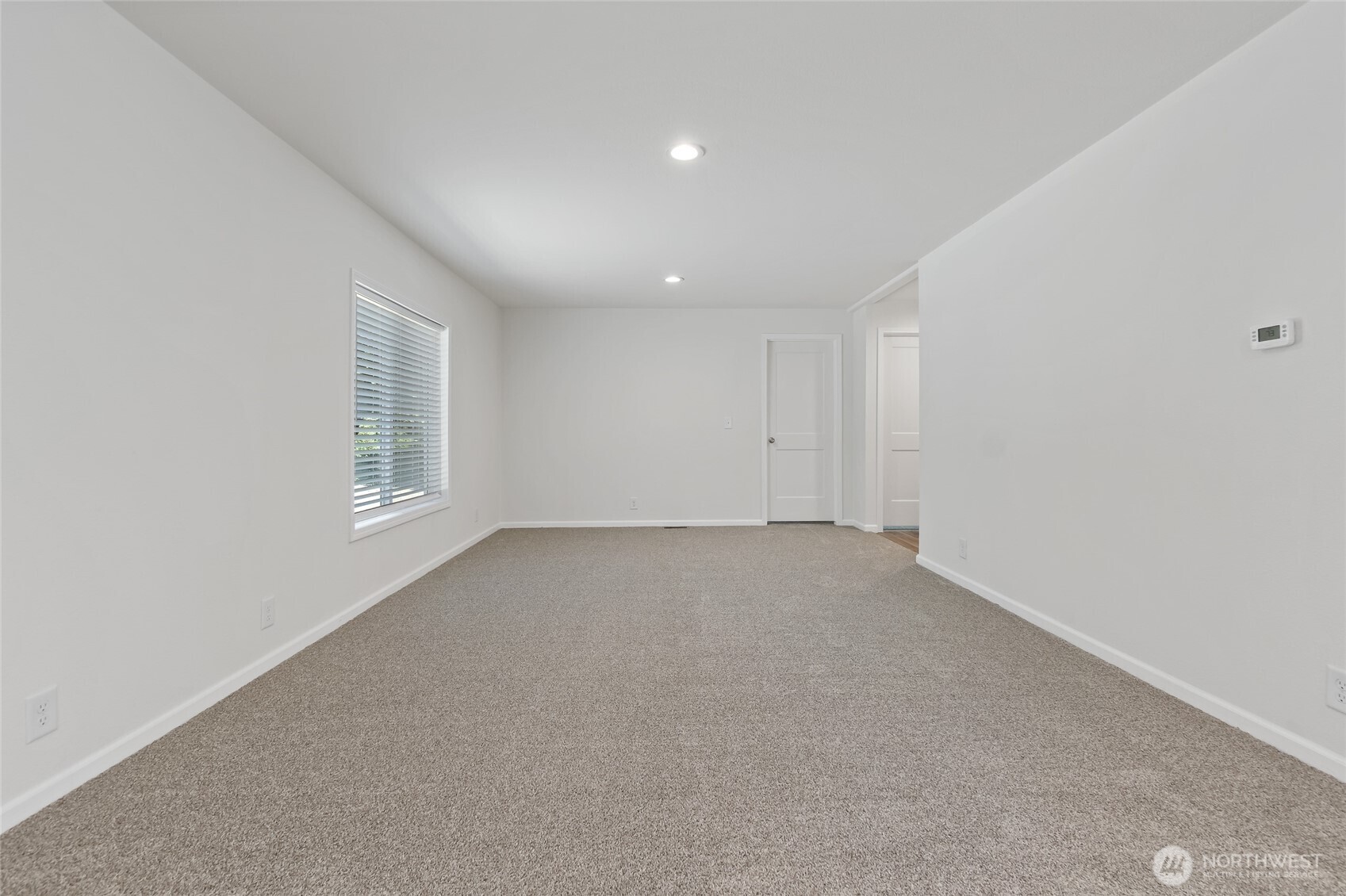 17217 80th Street Southwest Longbranch, WA 98351 - Photo 18 of 39 an empty room with windows