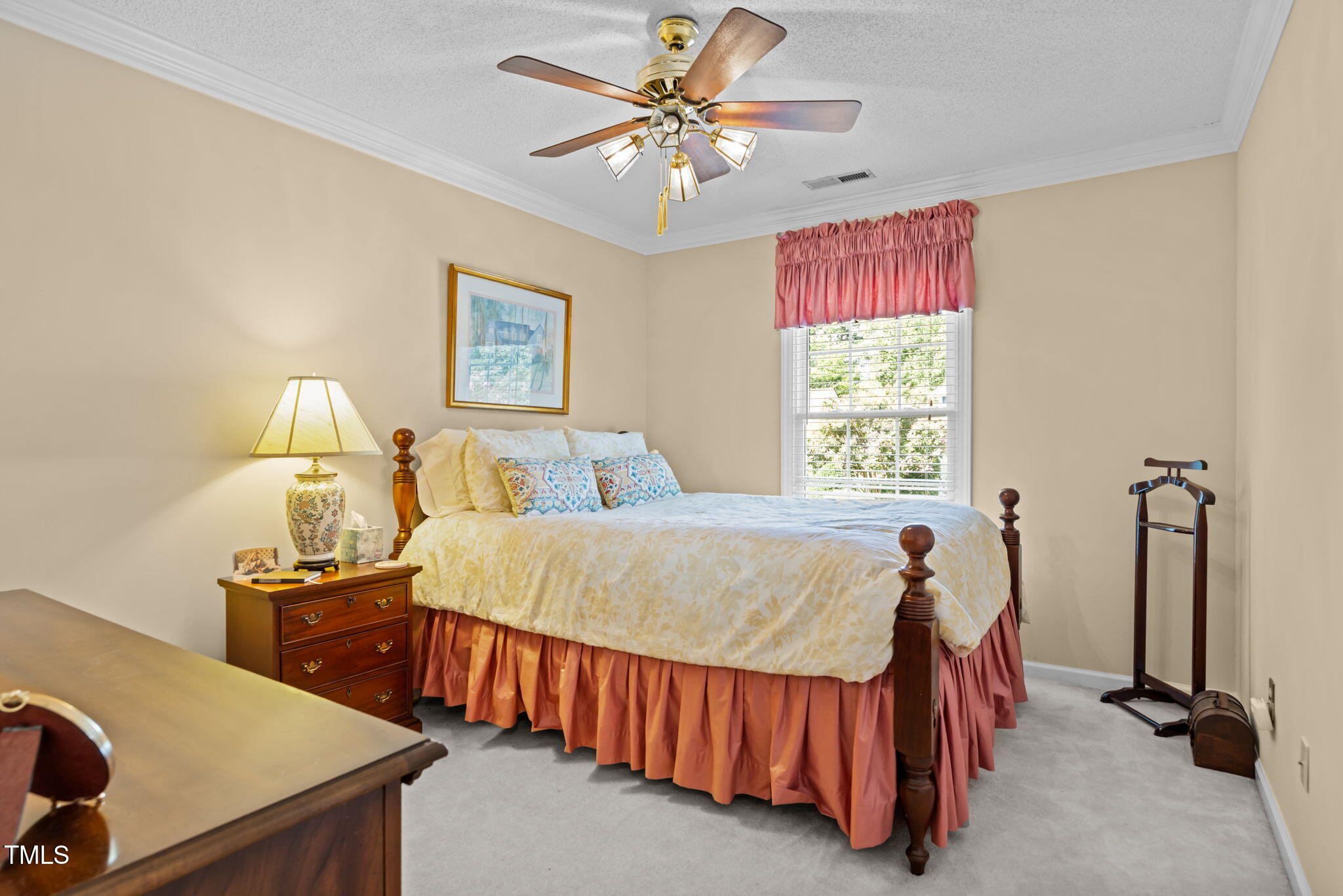 8516 Wheeling Drive Raleigh, NC 27615 - Photo 16 of 29 a bed room with a bed and a window